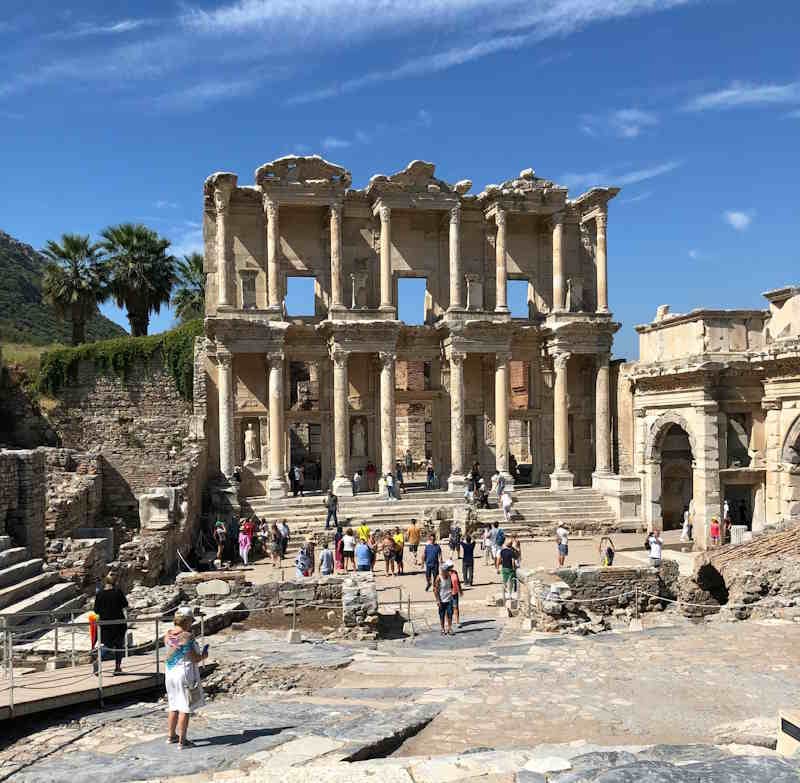 Visitors on the marble in front of the Library of Celsus at Ephesus